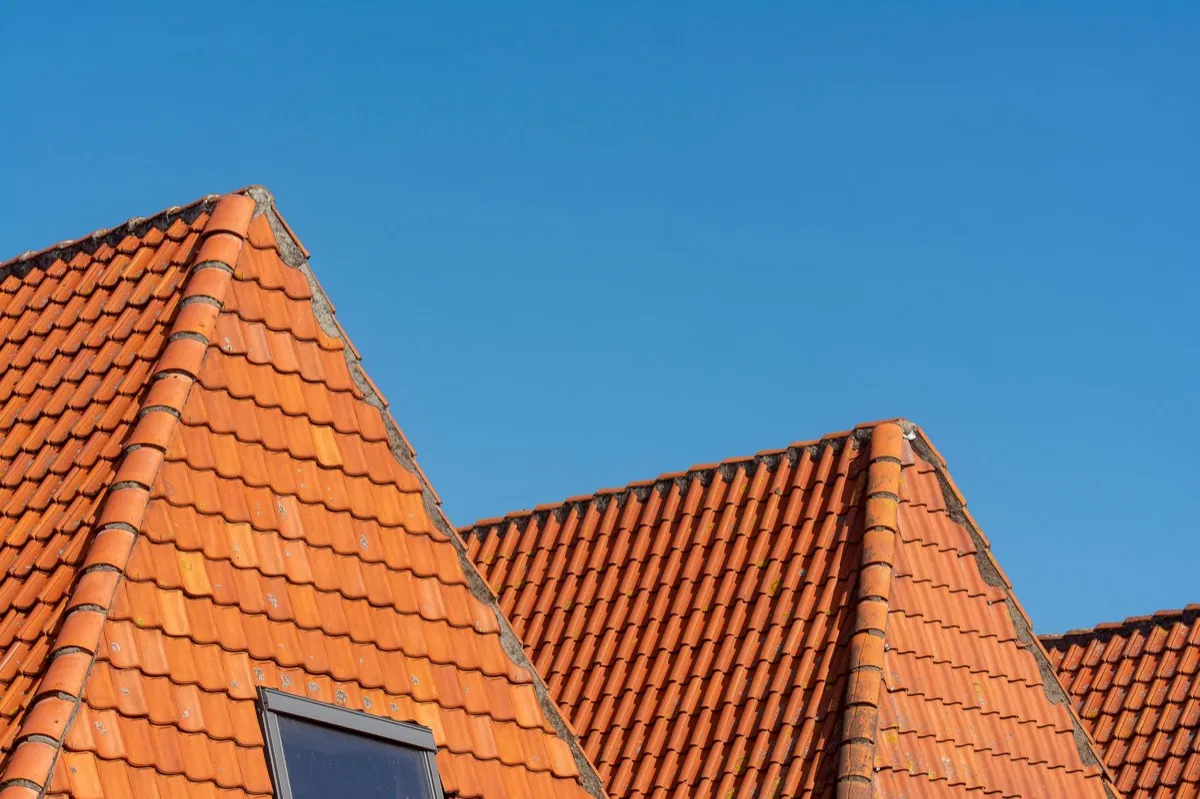 Clay barrel tile rooflines on homes in Battle Creek, MI