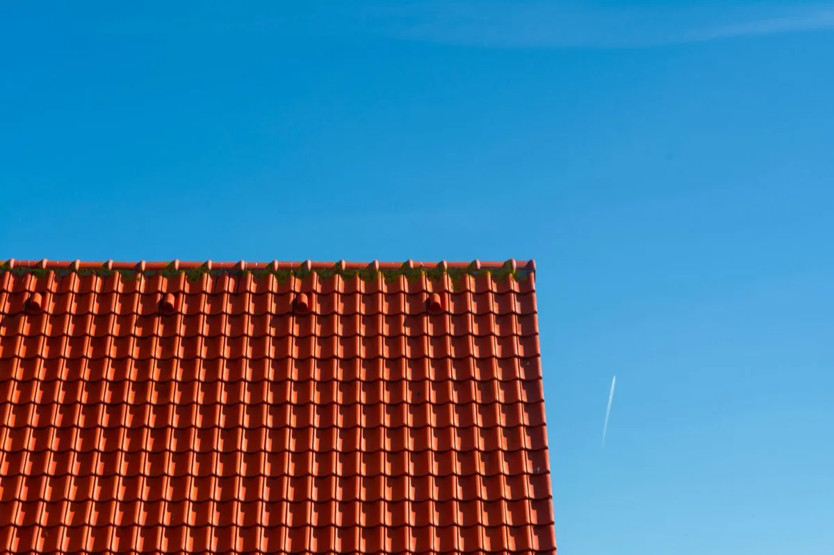 Tile roof gable in full sun, the kind of exposure that sets roof life in Battle Creek, MI